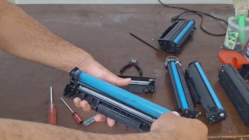 مرحله دوم: تخلیه مخزن تونر ضایعات (بسیار مهم!)